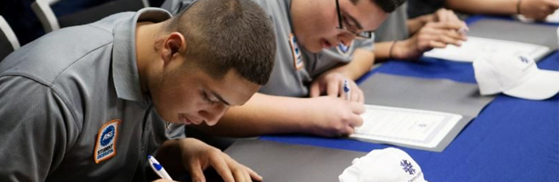 Two students sign letters of intent at National Signing Day