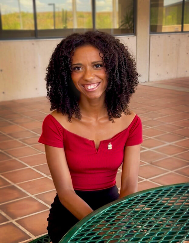 Malyssa Shaw poses for the camera at a PCC campus.