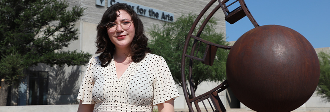 Vanessa Saavedra stands outside of the Center for the Arts at Pima West Campus
