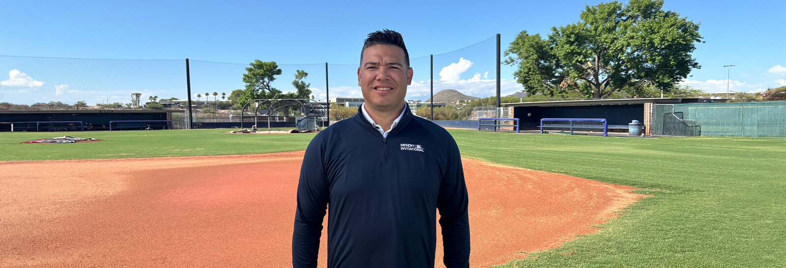 Brian Alday poses at the baseball field. 