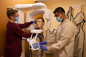 Pima Community College dental students with simulation mannequin