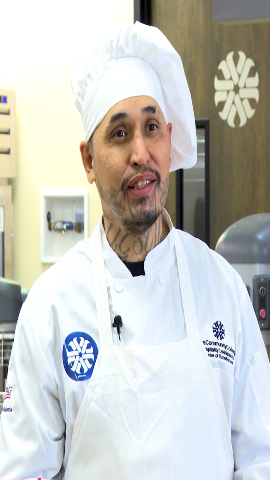 Oscar poses for the camera at the Desert Vista Center of Excellence in Hospitality Leadership.