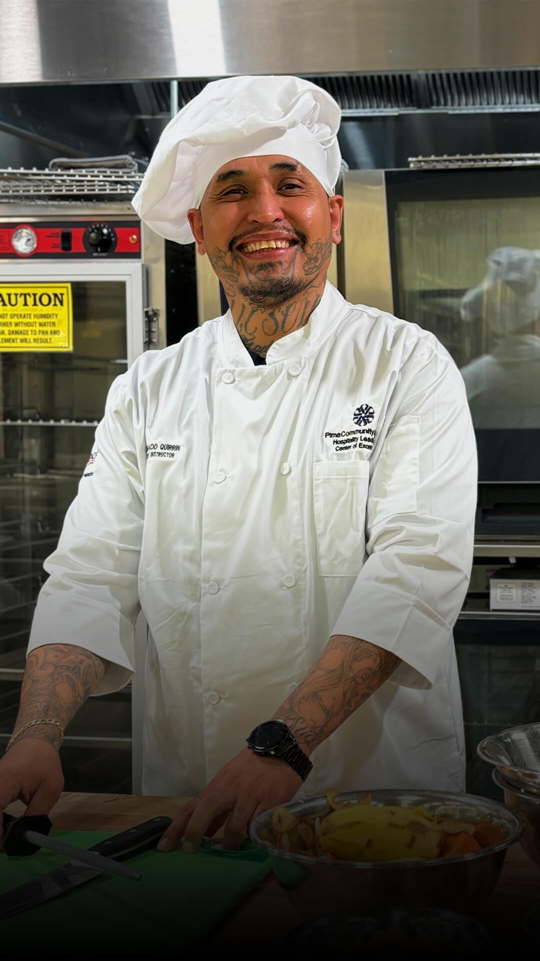 Oscar poses for the camera at the Desert Vista Center of Excellence in Hospitality Leadership.