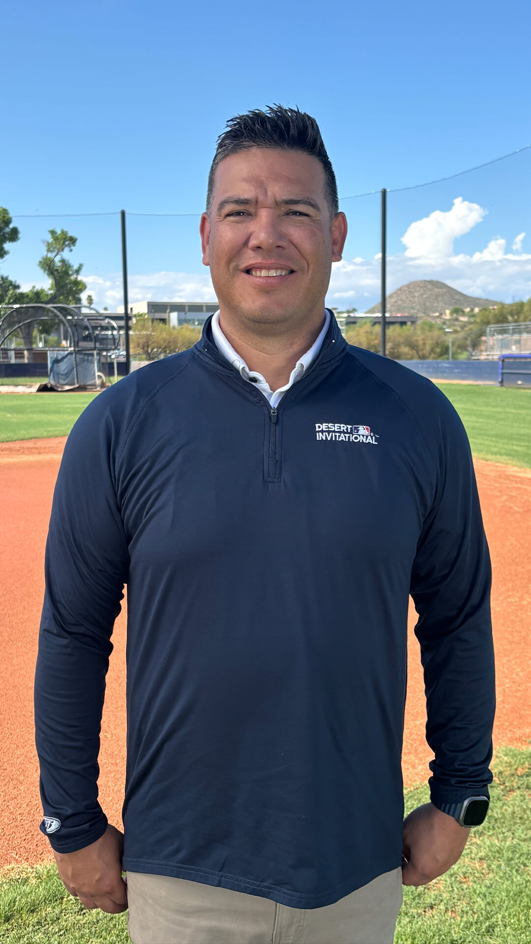 Brian Alday poses at the baseball field.