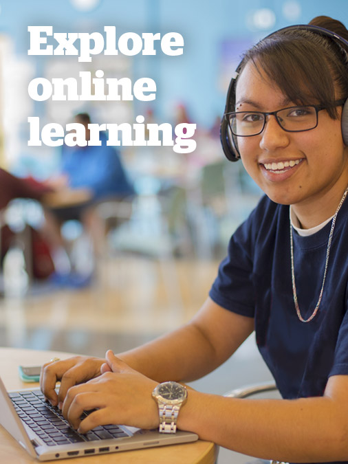 Explore online learning - female student using laptop