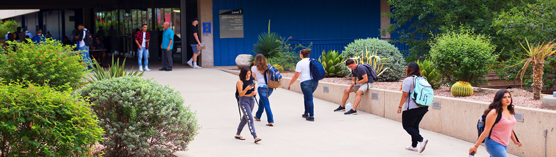 A student studies in a student common area on campus