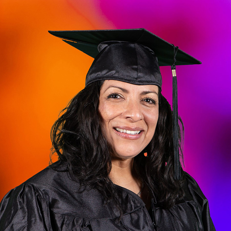 Sendalia poses for the camera at graudation.